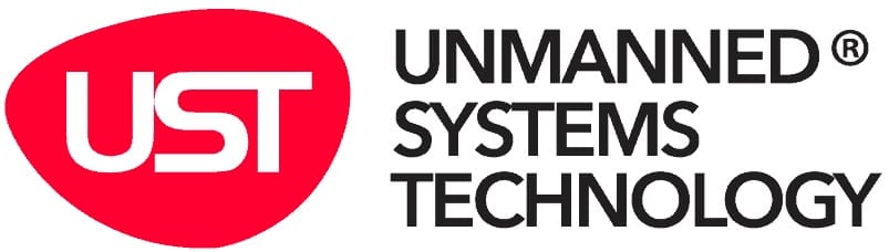 Logo of Unmanned Systems Technology (UST), featuring a red oval with the letters "UST" in white and the text "UNMANNED SYSTEMS TECHNOLOGY" in black next to it.