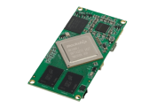 A small green circuit board with a prominent Rockchip processor and various other electronic components.